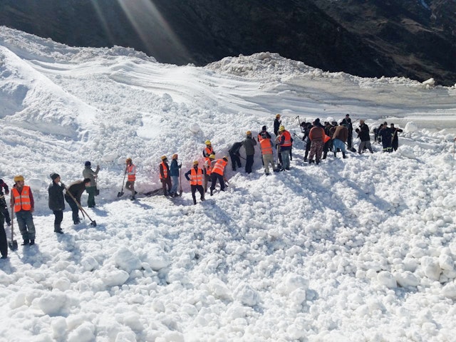 Community Emergency Response volunteers clear a road blocked by an avalanche in Badakhshan, Afghanistan. AKAH trains local volunteers to be able to prepare for and respond to disasters in their communities. Photo: AKAH Afghanistan