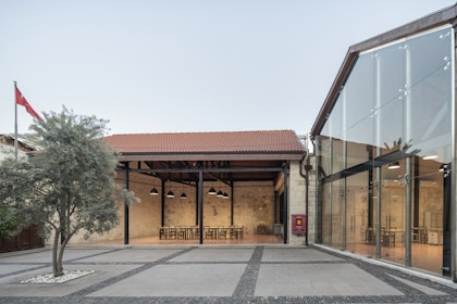 The inner courtyard is incorporated with the study room through a canopy reserved for researchers, whereas the area in front of the kitchen and café functions as an open area for various activities. | Aga Khan Trust for Culture / Cemal Emden (photographer)