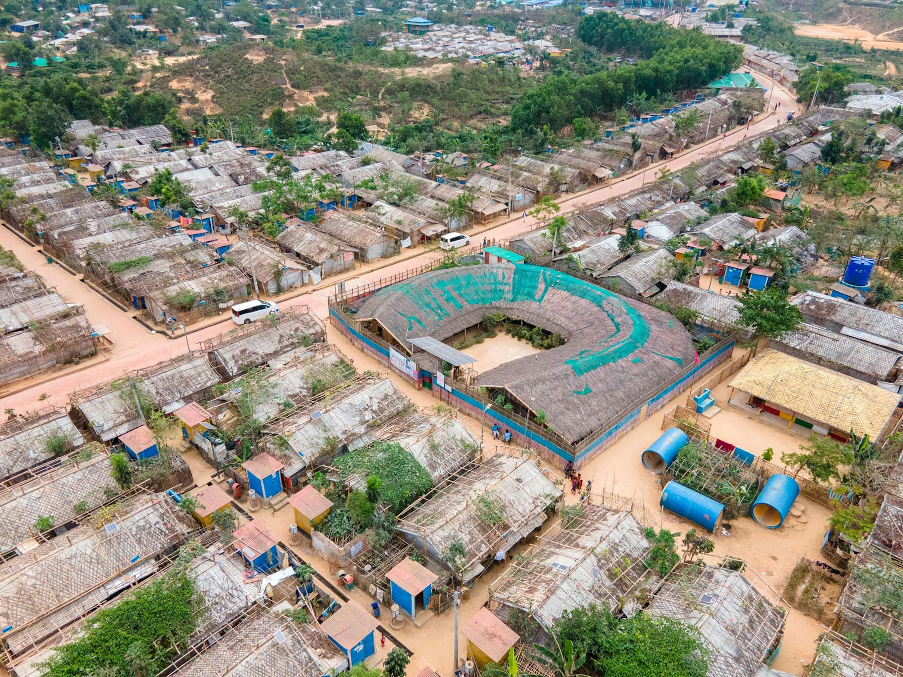 Aerial view of the Shantikhana Women Friendly Space in Camp 4ext. The construction started before the design was finalised, allowing the local Rohingya workers to express their artisanal skills and artistic freedom. | Aga Khan Trust for Culture / Asif Salman (photographer)