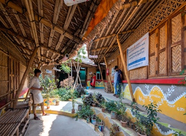 The display centre in camp 11 provides Rohingya women with a facilty to create, showcase and sell handmade products to visitors. The open courtyard connects the production workshop and the dispay centre. | Aga Khan Trust for Culture / Asif Salman (photographer)