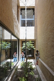 The interior spaces are organised around three different courtyards, thus providing more light and interaction with the exterior than the traditional central courtyard model. | Aga Khan Trust for Culture / Deed Studio (photographer)