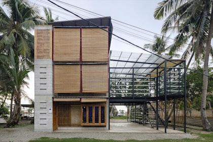 The expandable house combines a conventional steel-reinforced concrete frame with an aerated concrete block cladding and an innovative composite bamboo cladding. | Aga Khan Trust for Culture / Mario Wibowo (photographer)