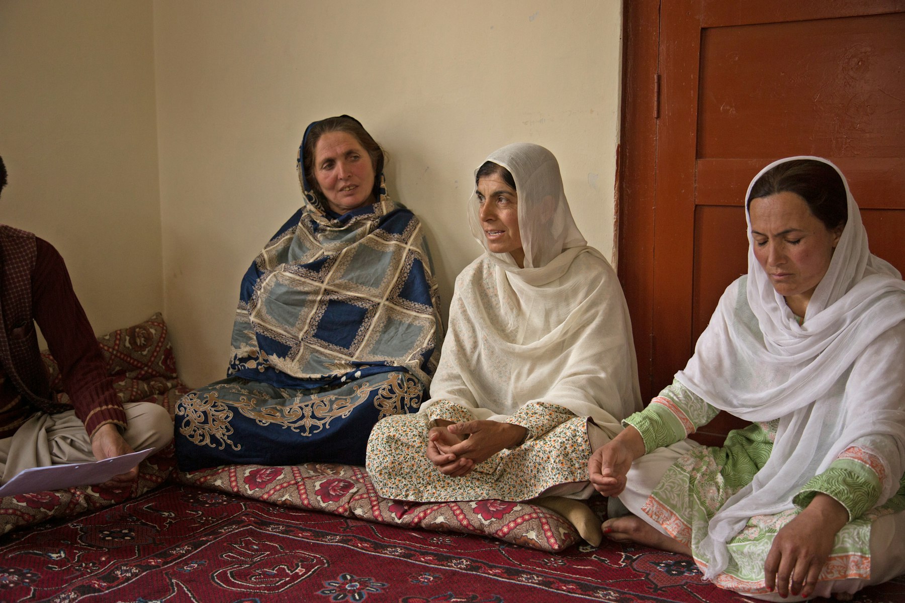 Gul Mahoor (centre) manages a health relief fund in Nasirabad, Pakistan.